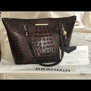 New Brahmin purse with bag and authenticity card.